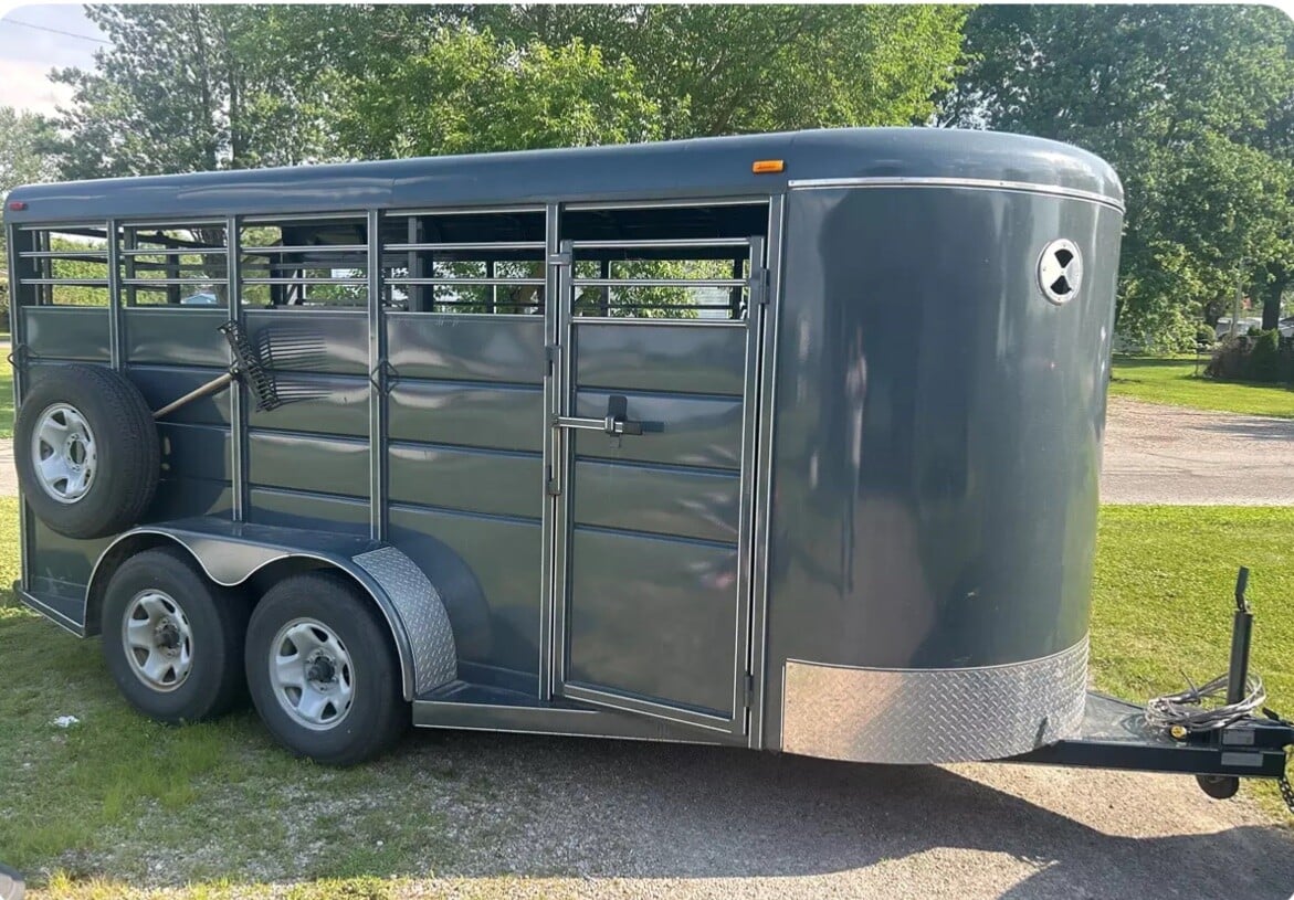 2021 Calico 16’ Stock Trailer with added interior lighting