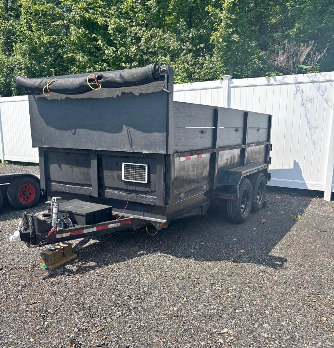 2008 Cam 7x14x4 dump trailer 14 yards.