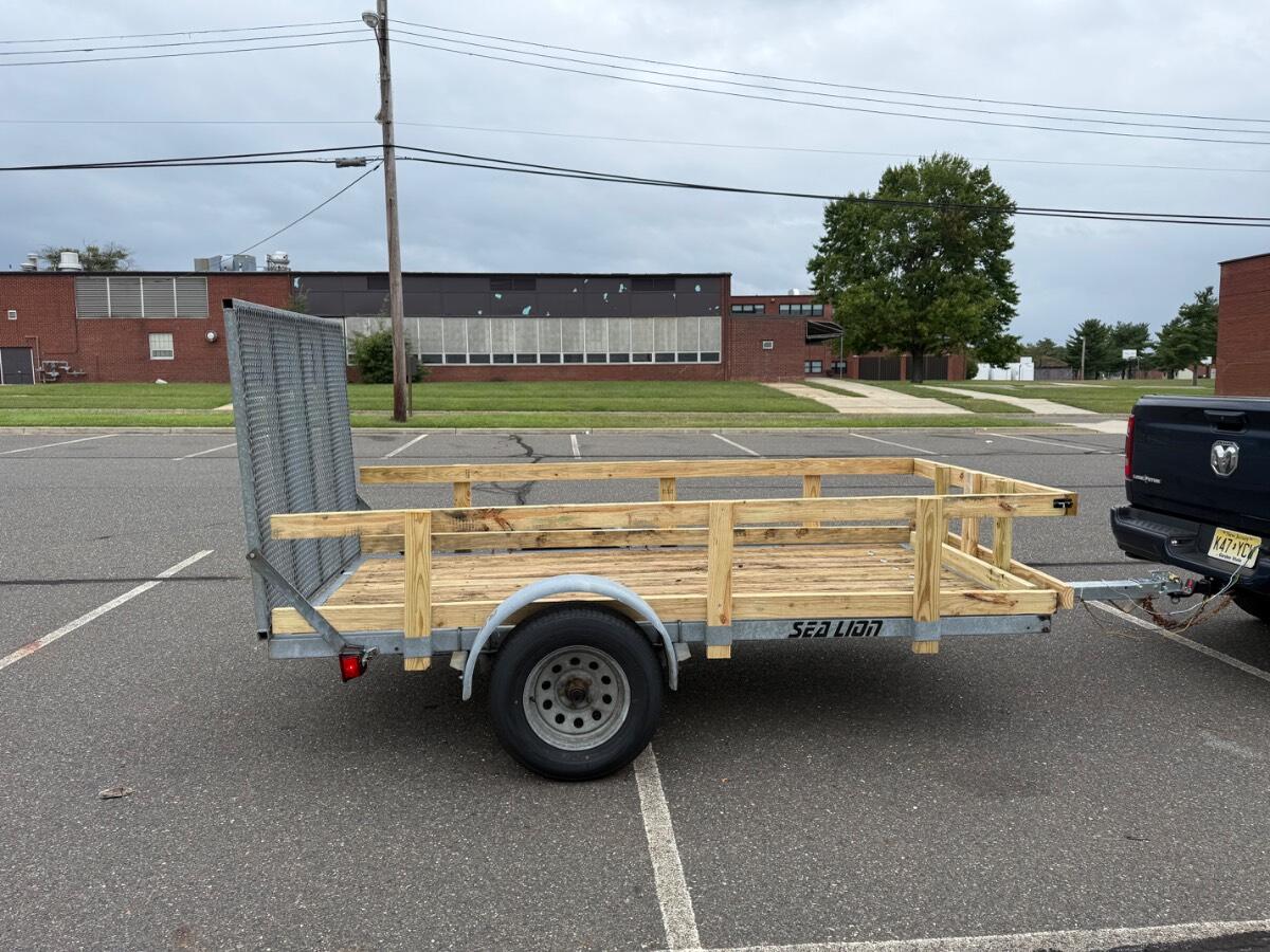 2002 Sea Lion Utility Trailer W/ Drop Ramp